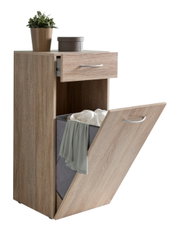 Wäschekommode aus Holz mit einer Schublade und einem ausklappbaren Fach, darauf eine Pflanze und eine Box, seitliche Perspektive
