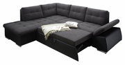 Dunkelgraue Rundecke mit ausziehbarem Bett, dekoriert mit Kissen und Decke, Perspektive von schräg oben.