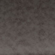 Nahaufnahme einer dunkelgrauen, strukturierten Oberfläche eines Schwingstuhls.