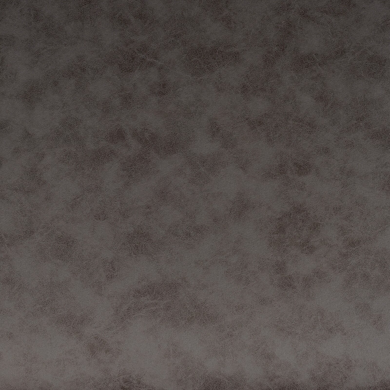 Nahaufnahme einer dunkelgrauen, strukturierten Oberfläche eines Schwingstuhls.