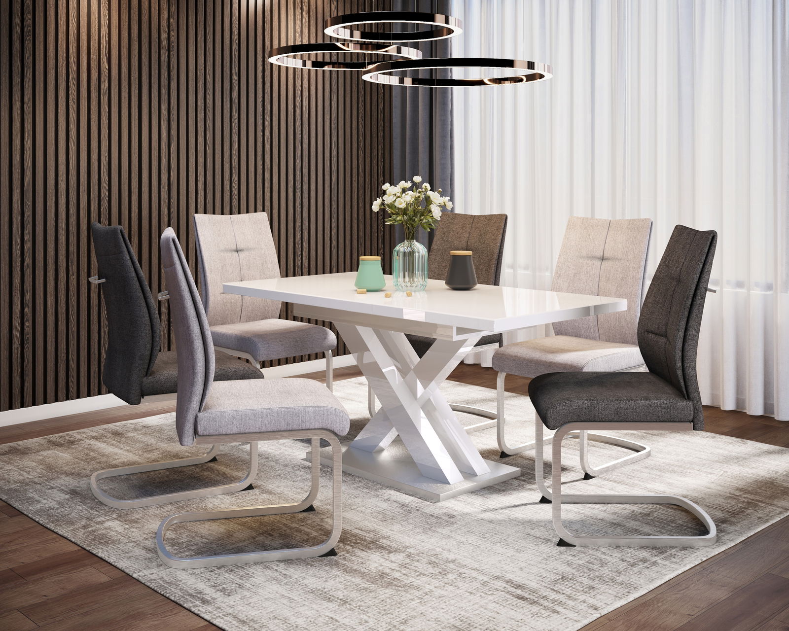 Esszimmer mit modernem Schwingstuhl-Set um einen weißen Tisch, seitliche Perspektive