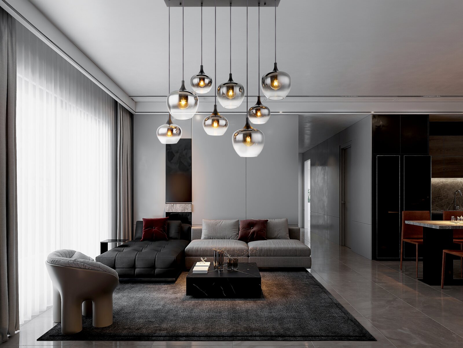 Moderne hanglamp met meerdere glazen bollen, van onderaf gezien in een stijlvolle woonkamer met een grijze bank en tapijt.