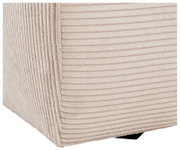 Close-up van een hoek van een grote bank met een beige, geribbelde stoffen bekleding, gezien vanaf de zijkant