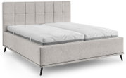 Gepolstertes Doppelbett/Boxspringbett in Hellgrau mit kariertem Kopfteil, zwei Matratzen und schwarzen schrägen Füßen, Ansicht schräg von vorne