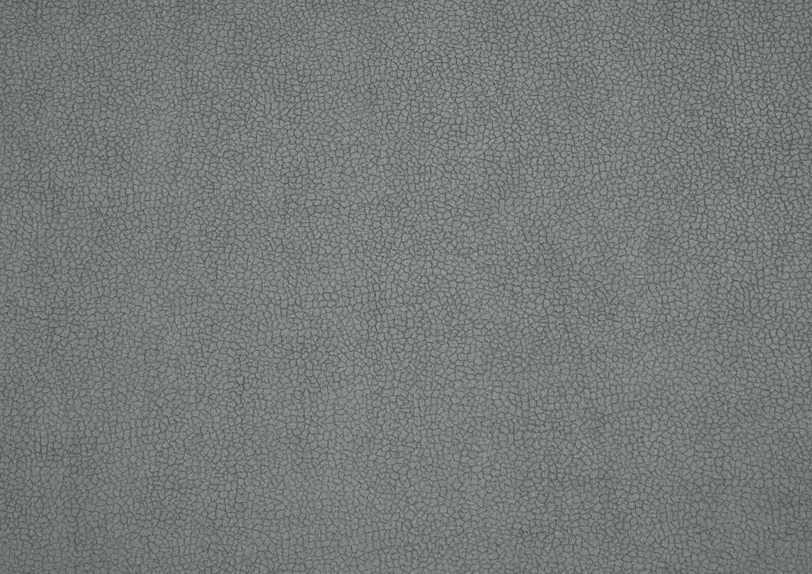 Beldomo System Ecksofa TAULON-S Nahaufnahme einer grauen, strukturierten Stoffoberfläche, die für eine Eckgarnitur verwendet wird.