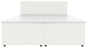 Wit, gestoffeerd boxspringbed met een hoog, gestoffeerd hoofdeinde en zwarte poten, vooraanzicht op een witte achtergrond.