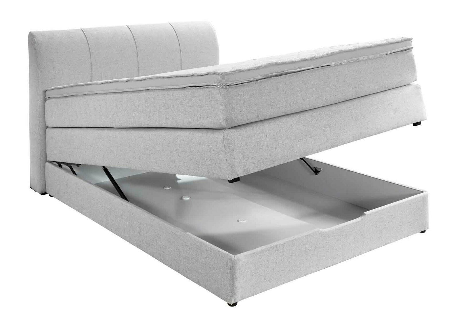 Boxspringbett mit geöffnetem Stauraum, seitliche Perspektive