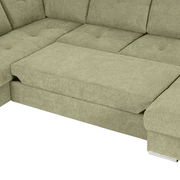 Grüne Ecksofa mit Ottomane, Ansicht von oben, zeigt die Sitzfläche und Rückenlehne.