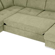 Grüne Ecksofa mit Ottomane, Ansicht von oben, zeigt die Sitzfläche und Rückenlehne.