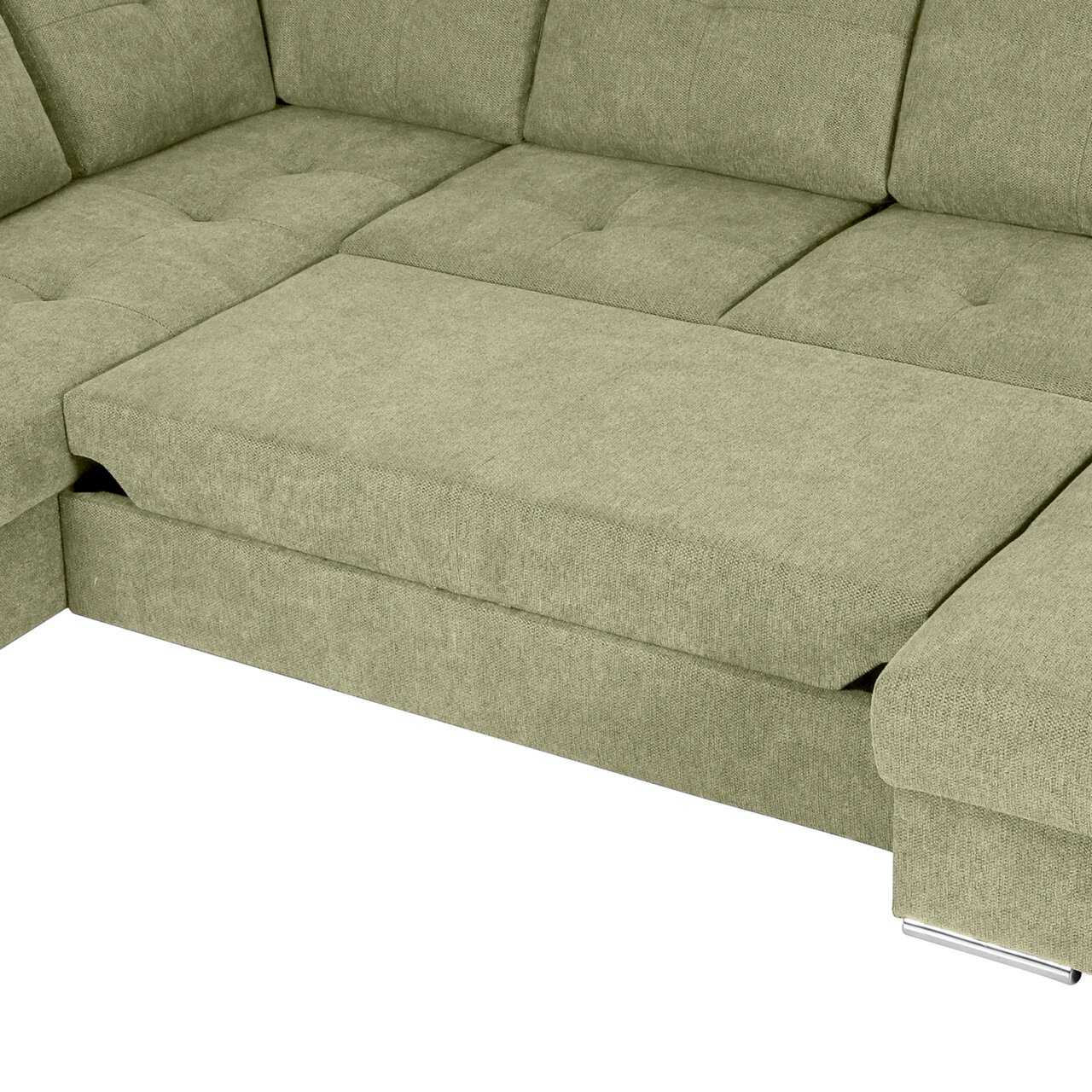 Grüne Ecksofa mit Ottomane, Ansicht von oben, zeigt die Sitzfläche und Rückenlehne.