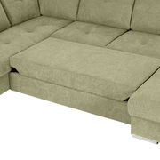 Grüne Ecksofa mit Ottomane, Ansicht von oben, zeigt die Sitzfläche und Rückenlehne.