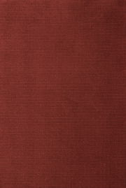 Nahaufnahme eines roten Stoffes mit feiner Textur, von oben betrachtet.