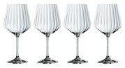 Vier elegante Gin Tonic Gläser mit geriffeltem Design, frontal abgebildet.