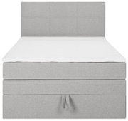 Graues Boxspringbett mit hohem Kopfteil, Frontalansicht