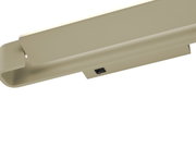 Nahaufnahme der LED-Wandleuchte BOX in beige mit Schalter, seitliche Perspektive