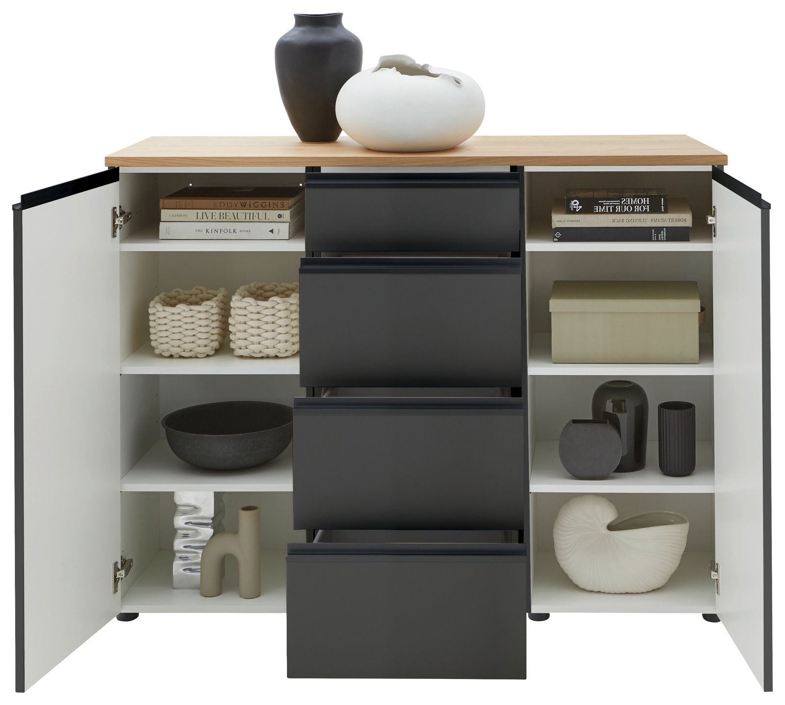 Kombi-Kommode 135 mit geöffneter Frontansicht, zeigt schwarze Schubladen und weiße Regalfächer mit dekorativen Objekten und Büchern.