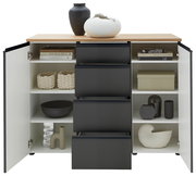 Kombi-Kommode 135 mit geöffneter Frontansicht, zeigt schwarze Schubladen und weiße Regalfächer mit dekorativen Objekten und Büchern.