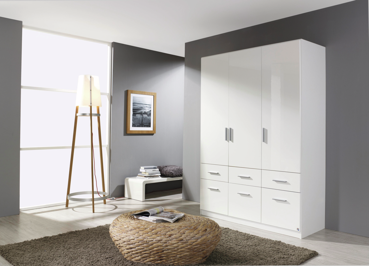 Moderner weißer Drehtürenschrank mit drei Türen und sechs Schubladen, seitliche Perspektive