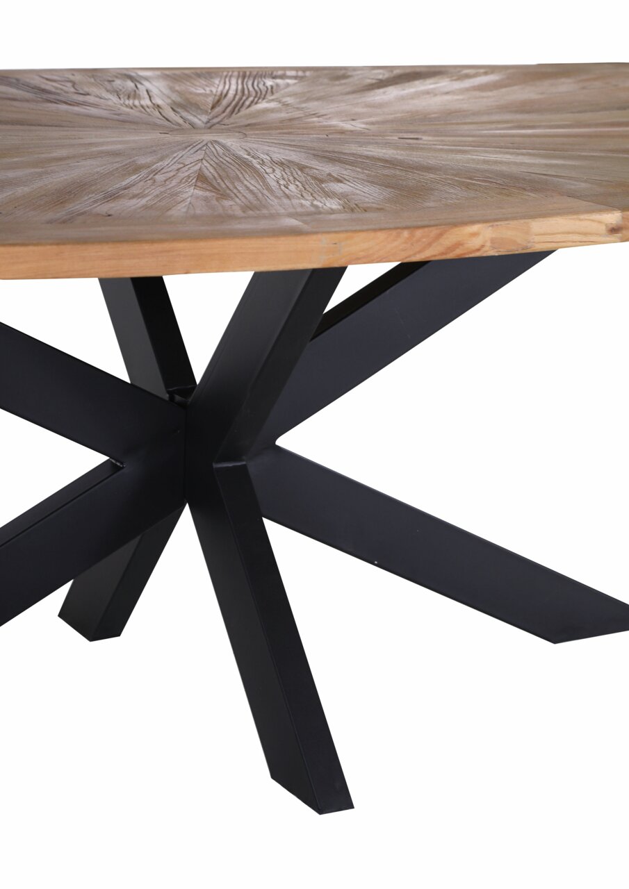 Nahaufnahme eines Esstisches mit runder Holzplatte und schwarzem Metallgestell, seitliche Perspektive.