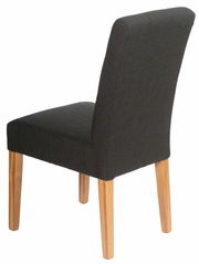 Rückansicht eines modernen Stuhls mit dunklem Stoffbezug und hellen Holzbeinen