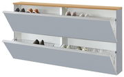 Modernes Schuhkippschrank/Schuhregal mit zwei nach vorne geöffneten Klappen, grauen Fronten und Holzoberplatte, innen Drahtkörbe mit Schuhen; Perspektive: schräg von vorne (3/4-Ansicht)