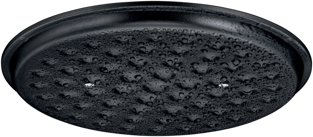 Deksel van een WMF Flavour-braadpan met waterdruppels, van onderaf gefotografeerd