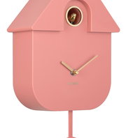 Rosa Wanduhr in Kuckucksuhren-Design mit goldenen Zeigern und einem kleinen goldenen Vogel, seitliche Perspektive