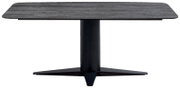 Moderne eettafel met een rechthoekig, donker tafelblad en een centrale, zwarte voet, gezien vanaf de voorkant.