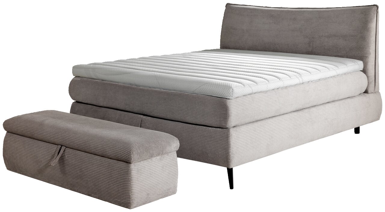 Boxspringbett 180x200 in grauem Stoff mit passendem Hocker, seitliche Perspektive