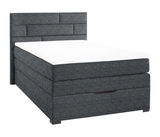 Graues Boxspringbett mit gestepptem Kopfteil, seitliche Perspektive