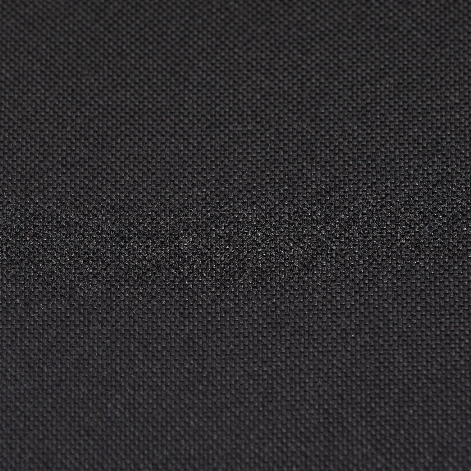 Nahaufnahme eines schwarzen Stoffes, möglicherweise Bezugsmaterial für einen Chefsessel.