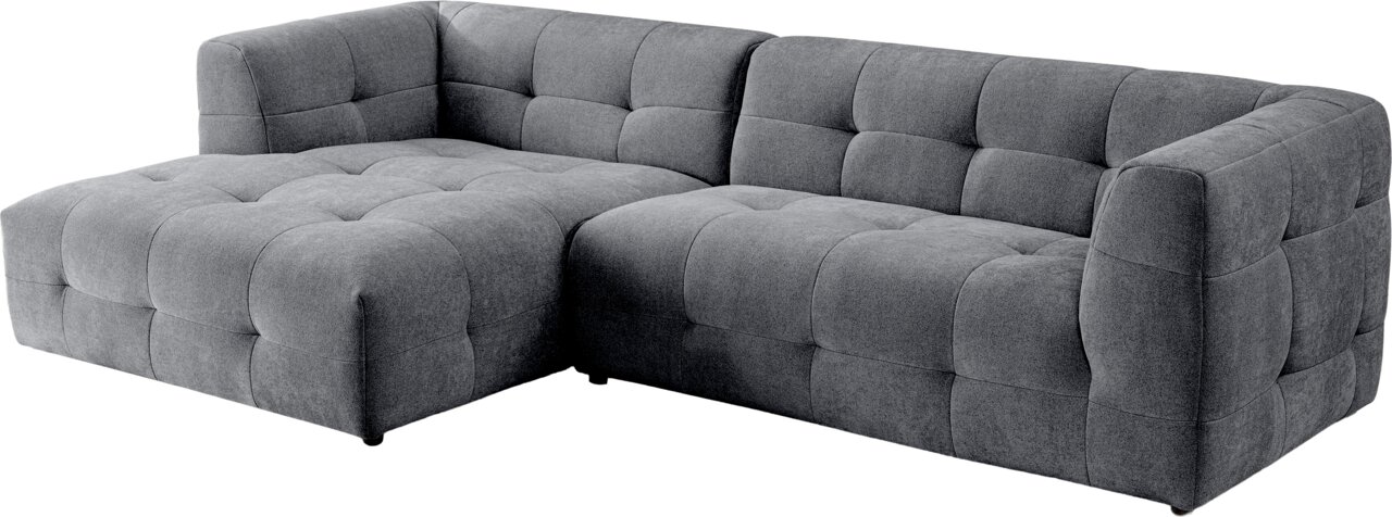 Graues, gepolstertes Ecksofa mit Steppung und breiter Ottomane, Ansicht schräg von vorne.