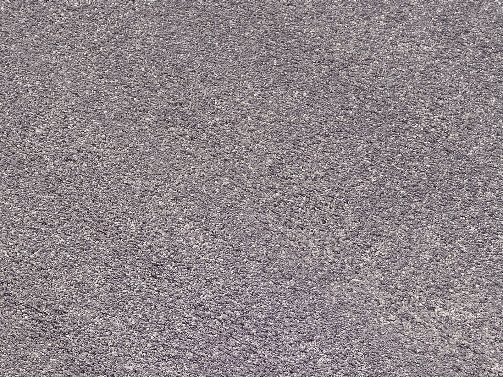 Grauer Uni-Teppich in Nahaufnahme, texturierte Oberfläche