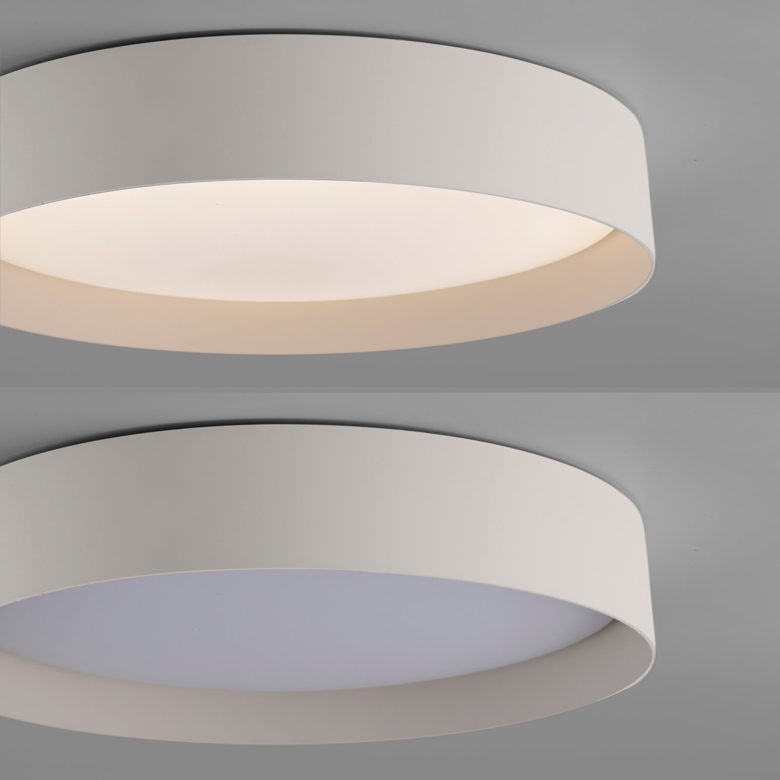 Runde, flache LED-Deckenleuchte in Weiß mit opalem Diffusor, eingeschaltet, Nahaufnahme in leichter Untersicht von unten.