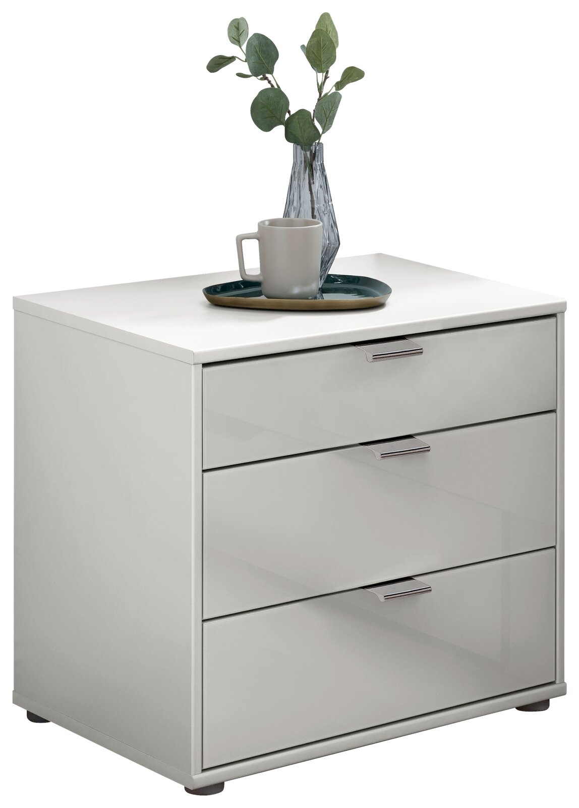 Moderner Nachtschrank mit drei Schubladen, dekoriert mit einer Vase und Tasse, seitliche Perspektive