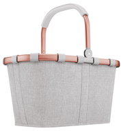 Grauer Einkaufskorb mit roséfarbenem Rahmen und Griff, seitliche Perspektive