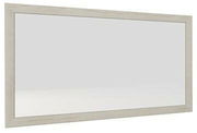 Rechteckiger Wandspiegel mit hellem Holzrahmen, seitliche Perspektive