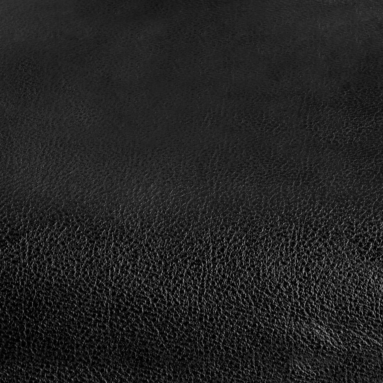 Nahaufnahme von schwarzem Lederbezug eines Bürostuhls