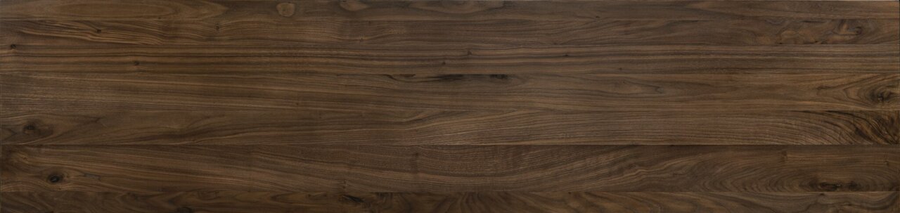 Bovenaanzicht van een houten oppervlak met natuurlijke nerf, gebruikt voor een bedframe.