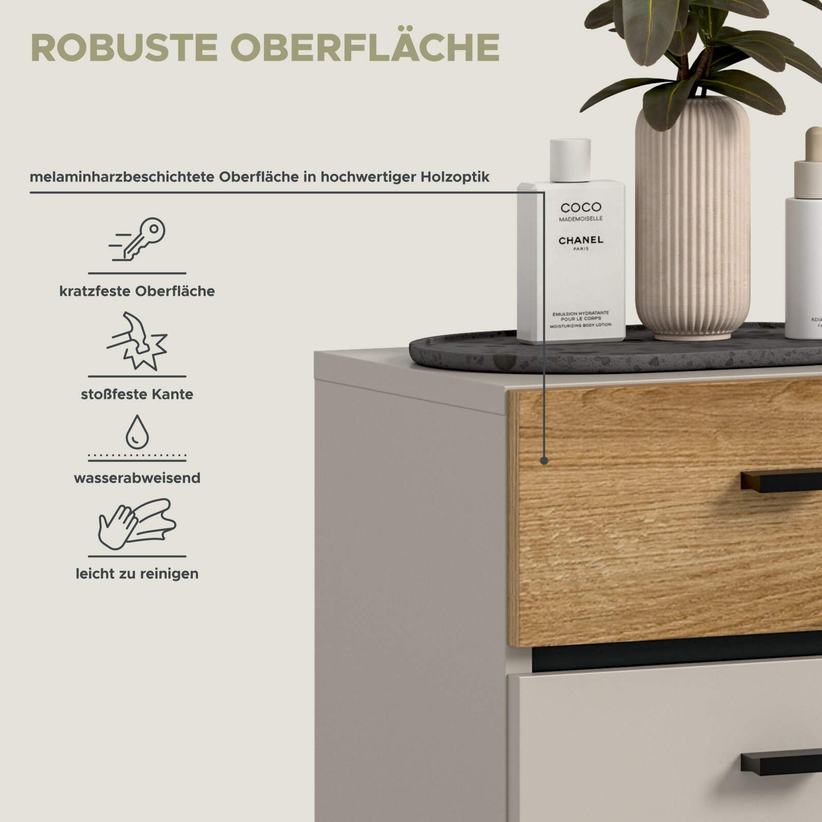 Nahaufnahme in frontaler Seitenansicht eines Badmöbels/Waschtischunterschranks in Weiß mit Holzoptik-Schubladenfront und schwarzem Griff; Textgrafik bewirbt melaminharzbeschichtete, robuste Oberfläche (kratzfest, stoßfeste Kante, wasserabweisend, leicht z