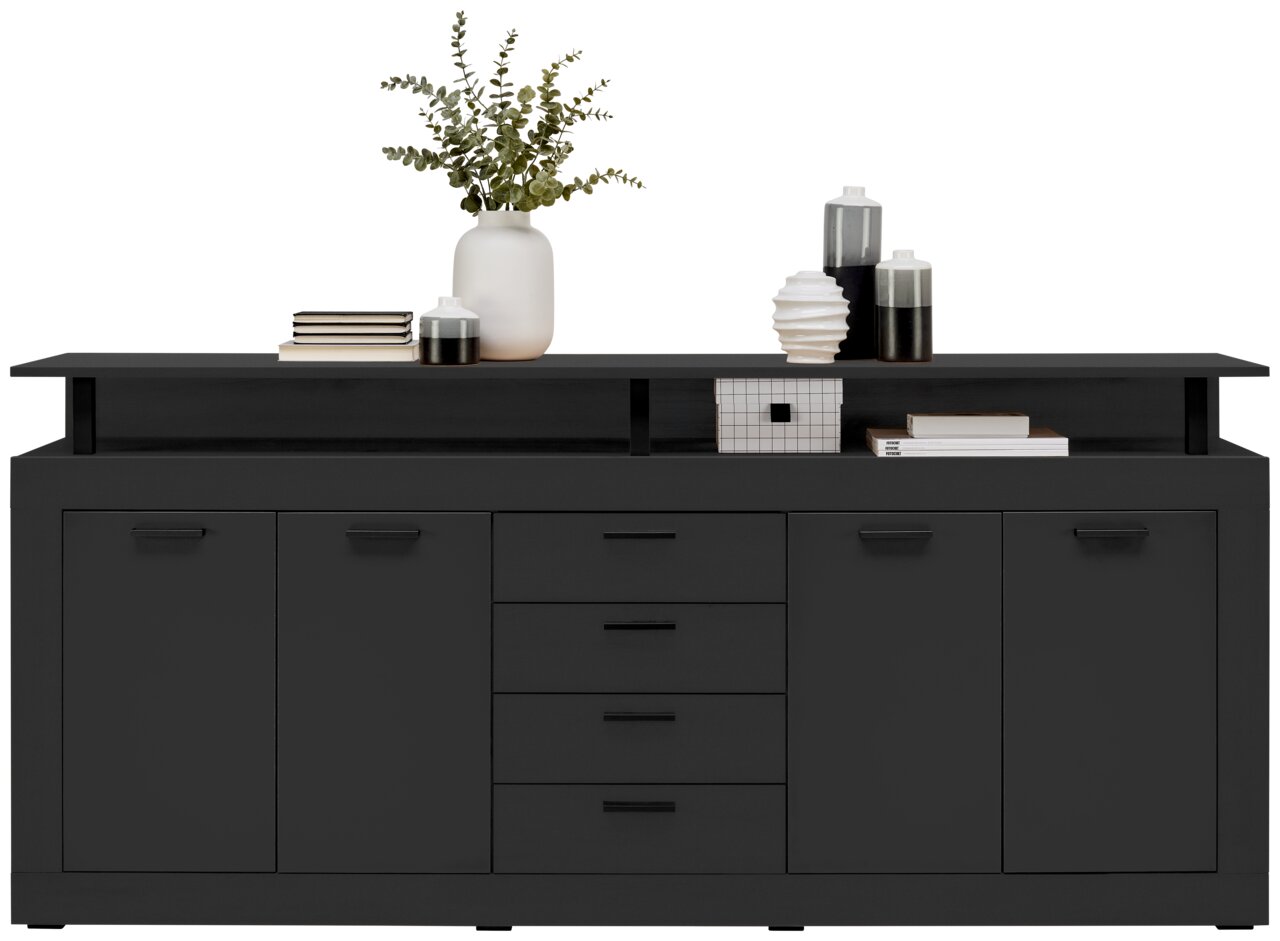 Frontale Ansicht eines modernen, schwarzen XL-Sideboards mit mehreren Schubladen und Türen, dekoriert mit Büchern, Vasen und Pflanzen.