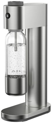 Wassersprudler STEEL aus gebürstetem Edelstahl, seitliche Perspektive mit eingesetzter Flasche und sprudelndem Wasser.