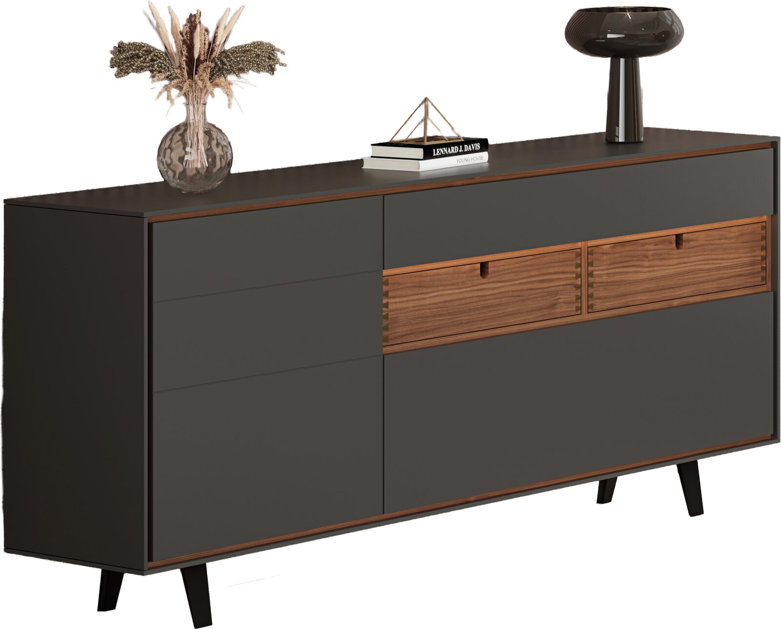 Moderne Kommode/Sideboard in Anthrazit mit zwei Holz-Schubladen und schlanken schwarzen Beinen, dekoriert mit Vase, Büchern und Lampe, gezeigt in leichter Frontansicht aus schräger Perspektive