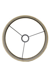 Ansicht von oben auf einen zylindrischen Lampenschirm mit Metallstreben.