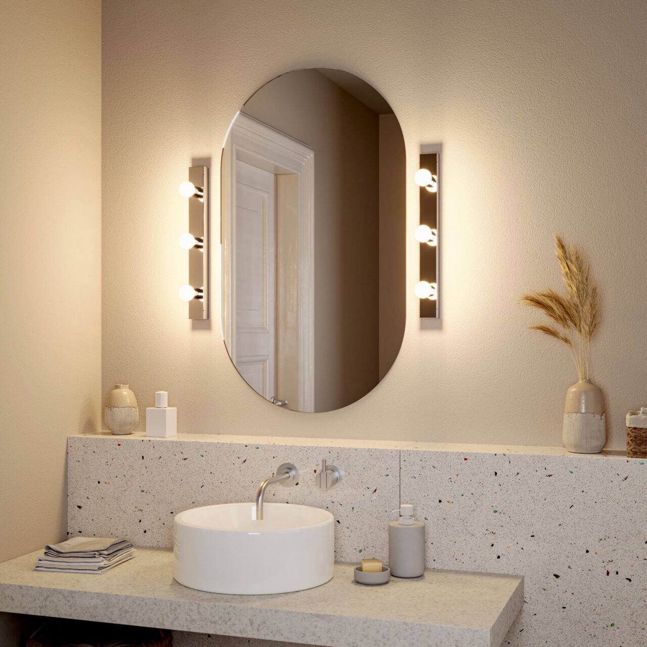 PAULMANN LED Leuchtmittel URAIL Badezimmer mit ovalem Spiegel, flankiert von zwei LED-Leuchtmitteln, die warmes Licht ausstrahlen. Perspektive: Frontalansicht auf den Spiegel und das Waschbecken.