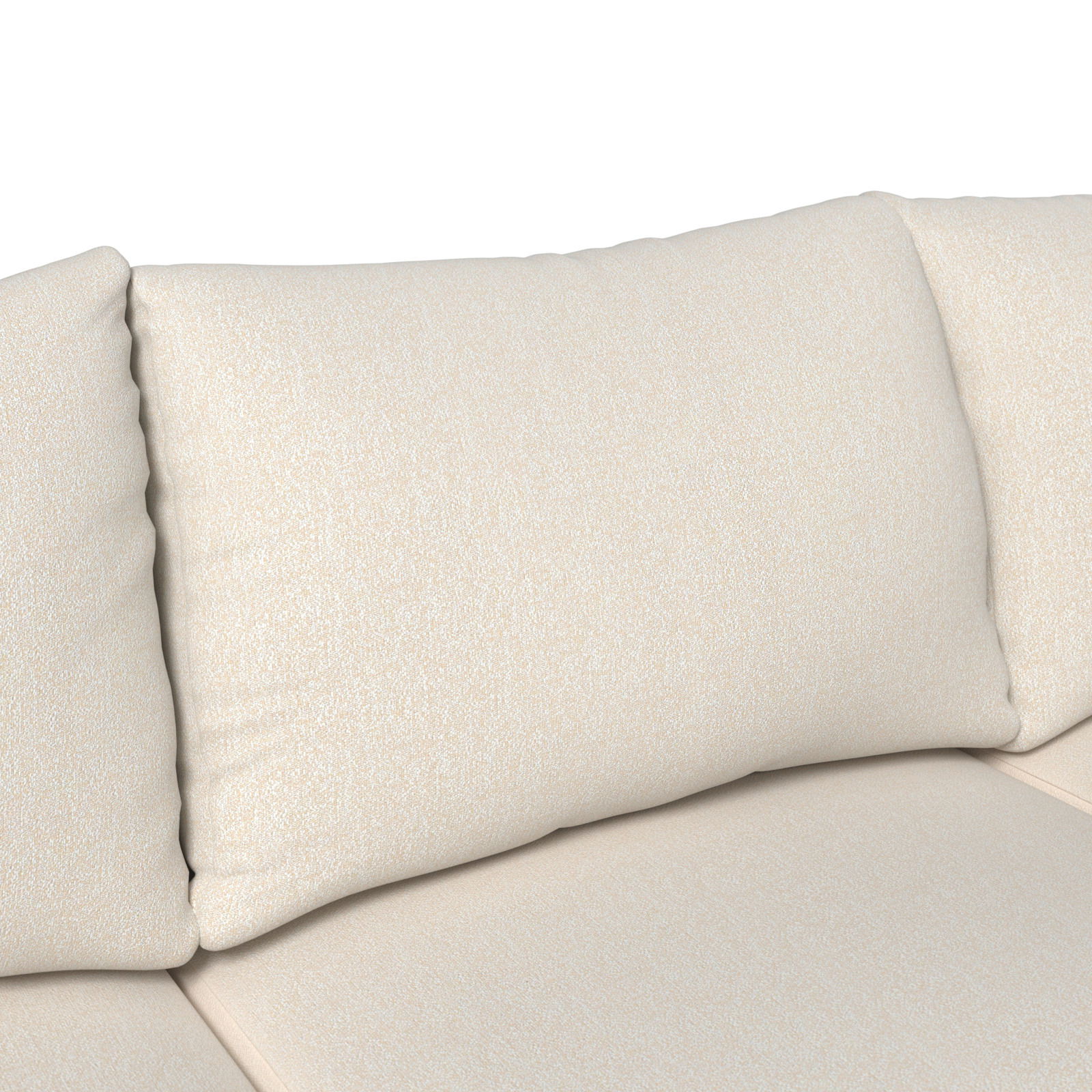 Nahaufnahme eines beigen Lounge-Sofakissens mit weicher Textur, seitliche Perspektive.