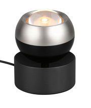 Moderne Tischleuchte mit kugelförmigem Design, silbernem und schwarzem Finish, aus seitlicher Perspektive fotografiert.