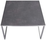 Moderner Beistelltisch mit dunkler Tischplatte und Metallgestell, Ansicht von oben.