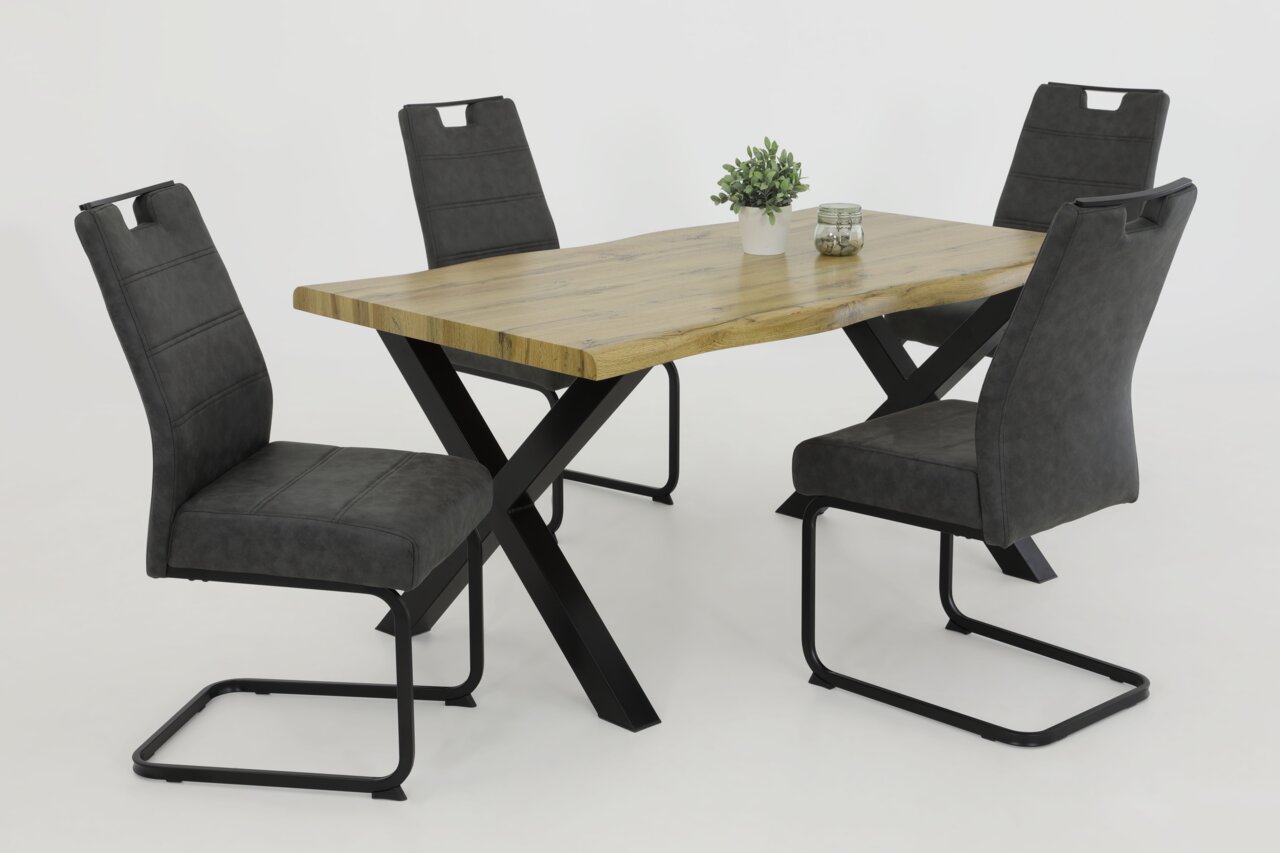 Esszimmer mit einem Holztisch und vier modernen Schwingstühlen in dunklem Grau, seitliche Perspektive