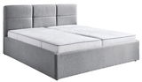 Graues Polsterbett 180x200 mit hohem Kopfteil, seitliche Perspektive